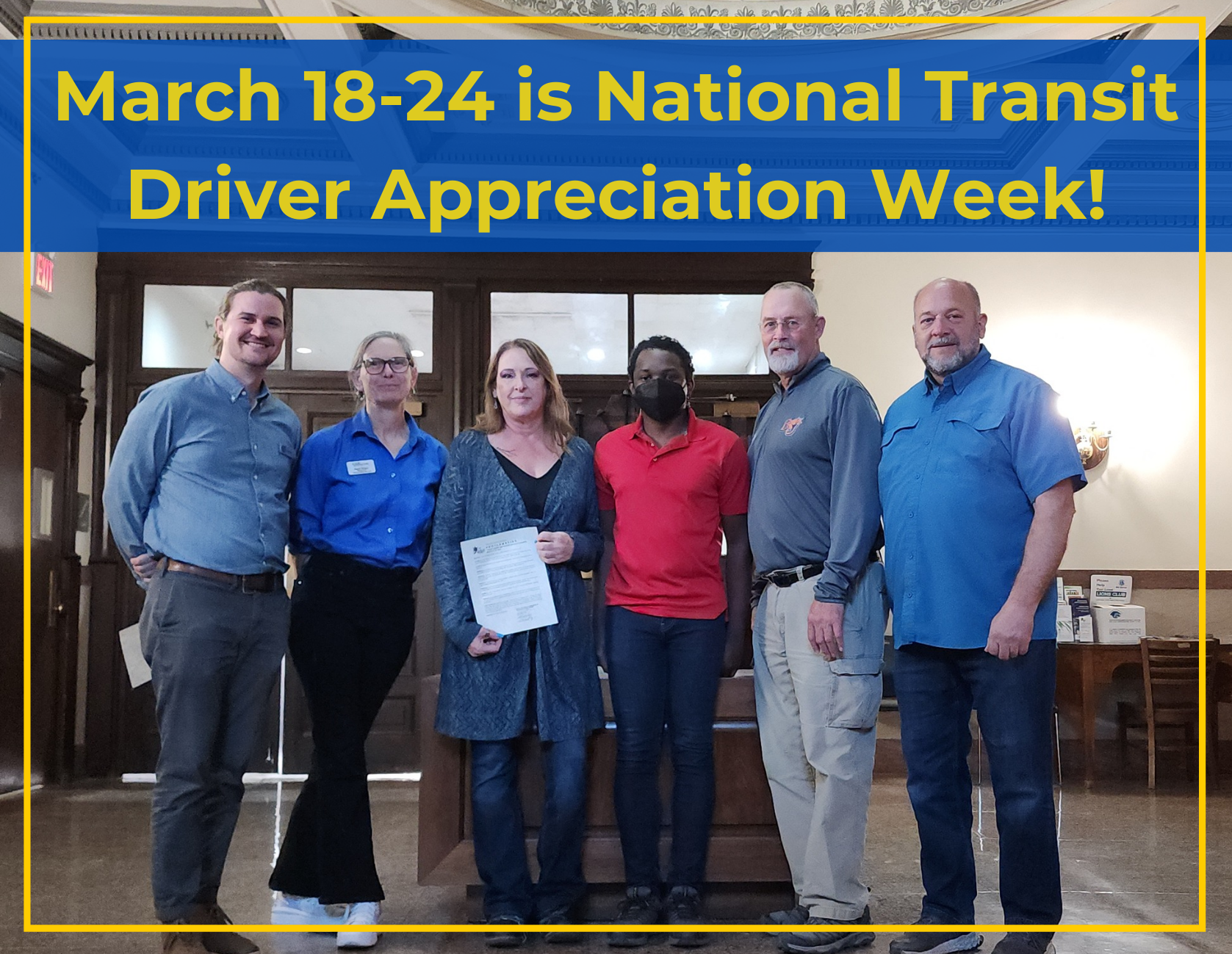 Photo of Independence, Inc. Transportation Manager LaNeece Jardon, side by side with other local transit managers and drivers, posed after accepting the Douglas County Commission Driver Appreciation Proclamation at Lawrence City Hall